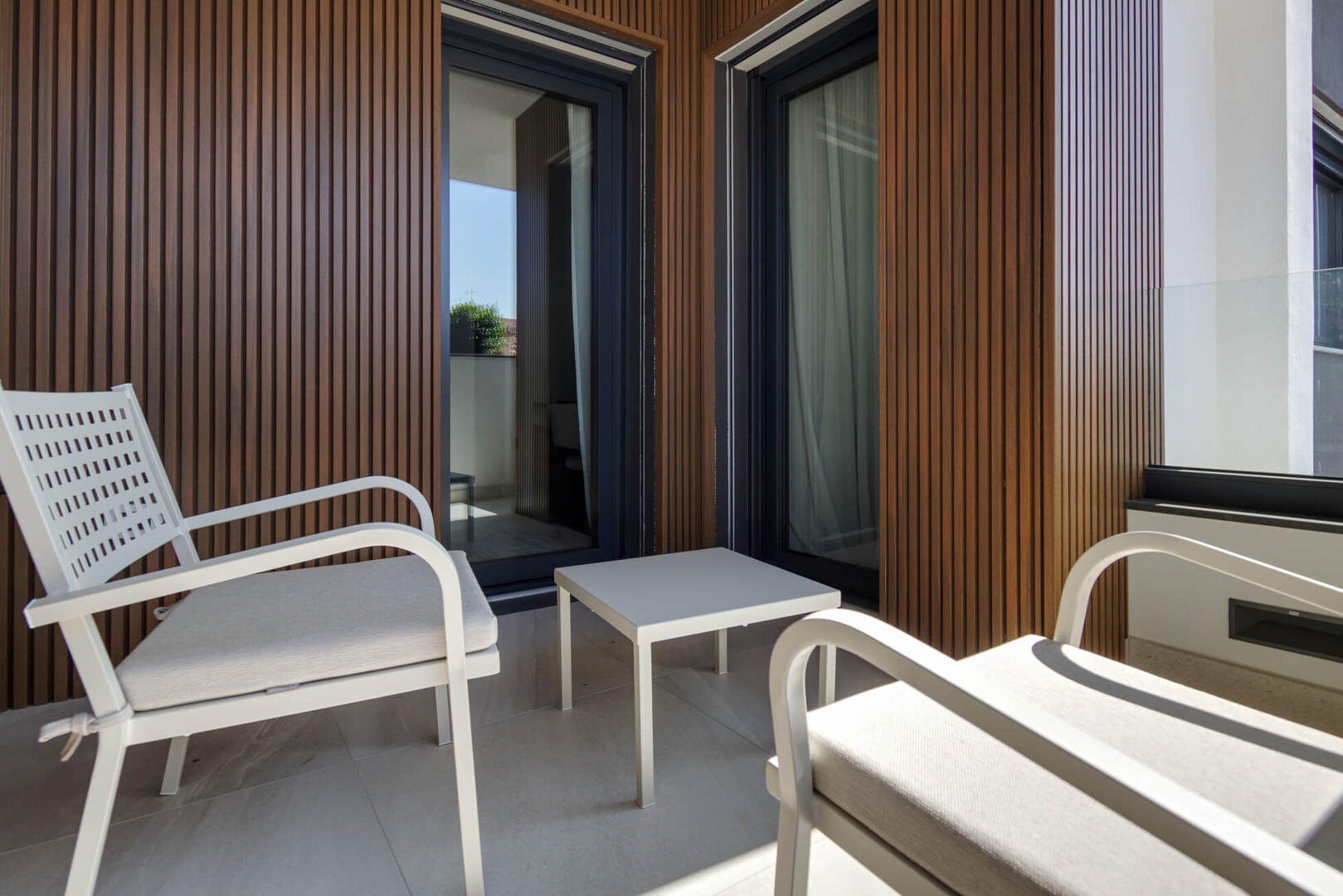 Relax and sip your wine or espresso on this quiet and secluded second terrace.